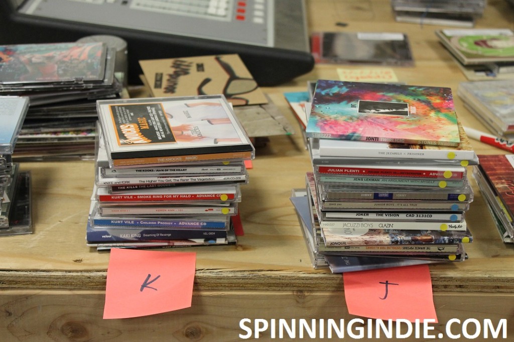 Piles of CDs at college radio station Rainy Dawg Radio
