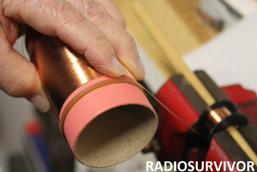 winding copper wire onto paper tube