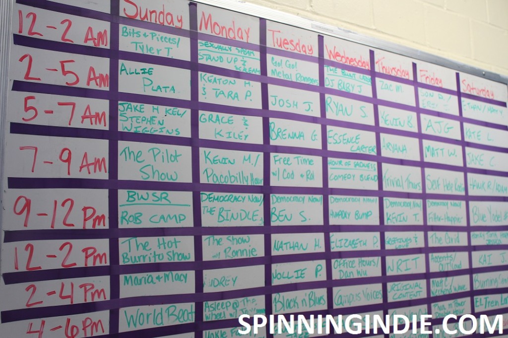 white board with WRFL program schedule