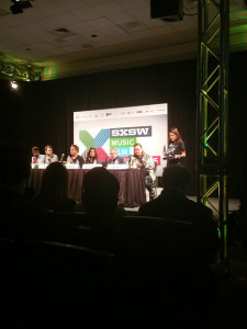 Paul Krugman (second from right) among the rockers at SXSW.