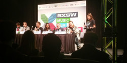 Paul Krugman (second from right) among the rockers at SXSW.