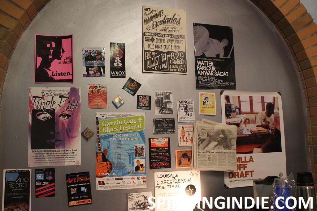 posters and flyers on wall at ARTxFM