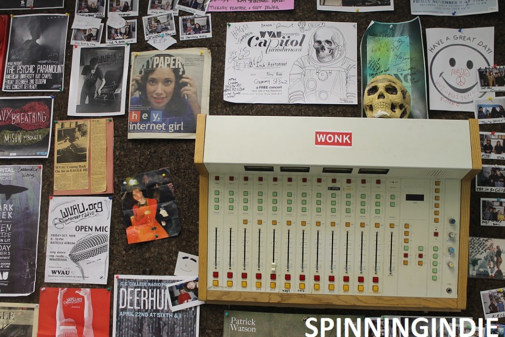studio wall at college radio station WVAU with board and skull