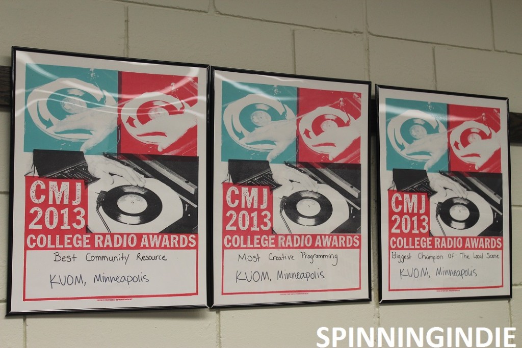 CMJ awards on wall at Radio K