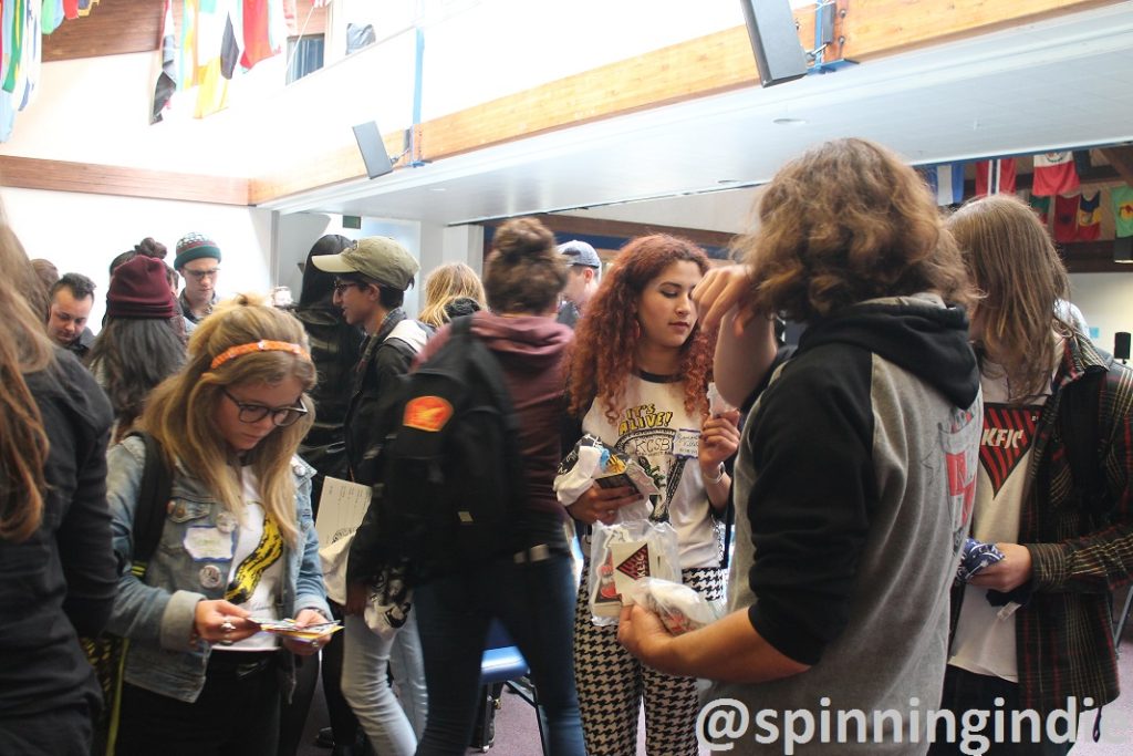 College radio DJs mingle at the UCRN swag swap. Photo: J. Waits