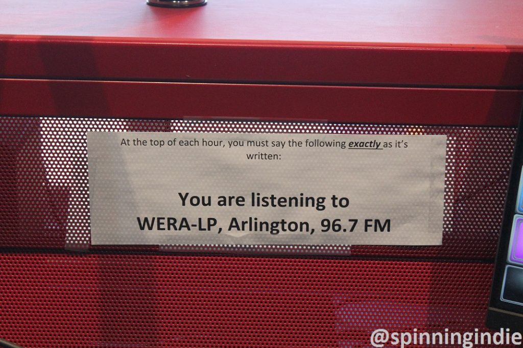WERA-LP's legal ID posted in radio station studio. Photo: J. Waits