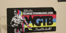 WGTB sticker on Georgetown college radio station wall. Photo: J. Waits