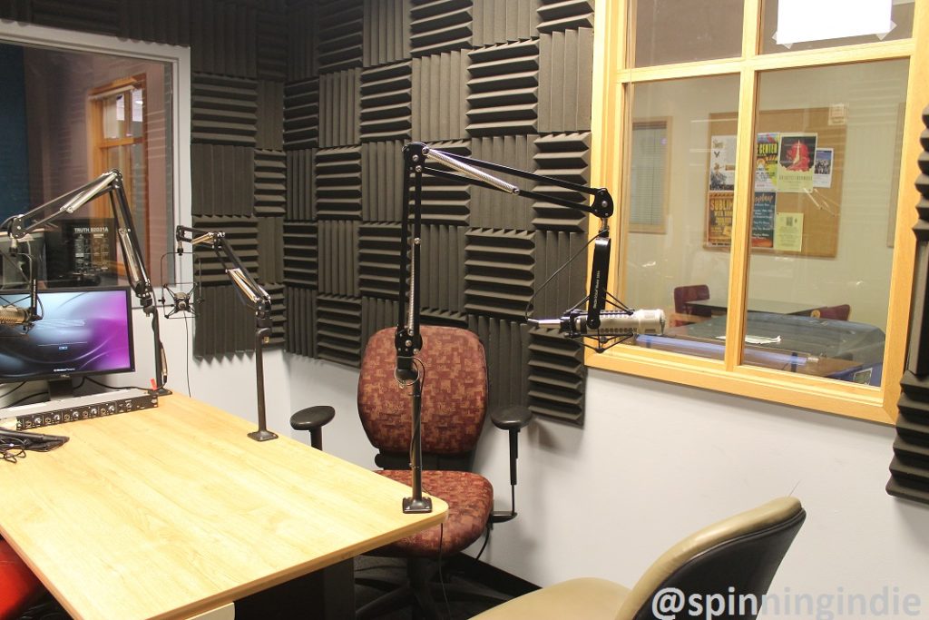 Met Radio studio with view of on-air booth (to left) and window to hallway (to right). Photo: J. Waits