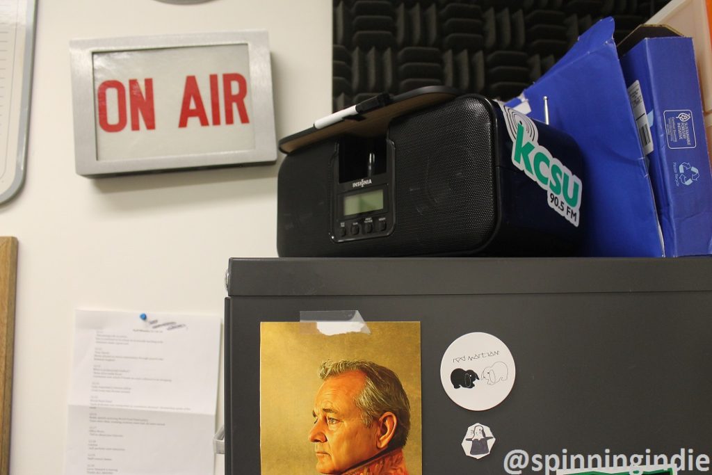 On Air sign, radio, and artifacts at KCSU. Photo: J. Waits