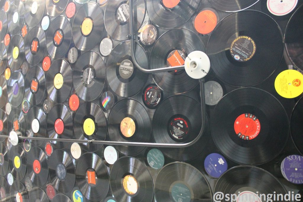Records on the ceiling at Radio 1190. Photo: J. Waits
