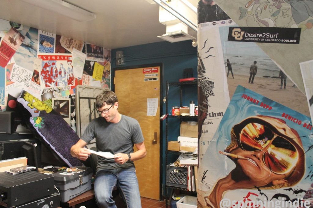 Mikey Goldenberg in music office at Radio 1190. Photo: J. Waits