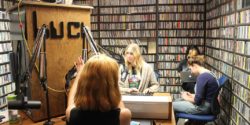 DJs in the on-air booth at college radio station KUCI. Photo: J. Waits