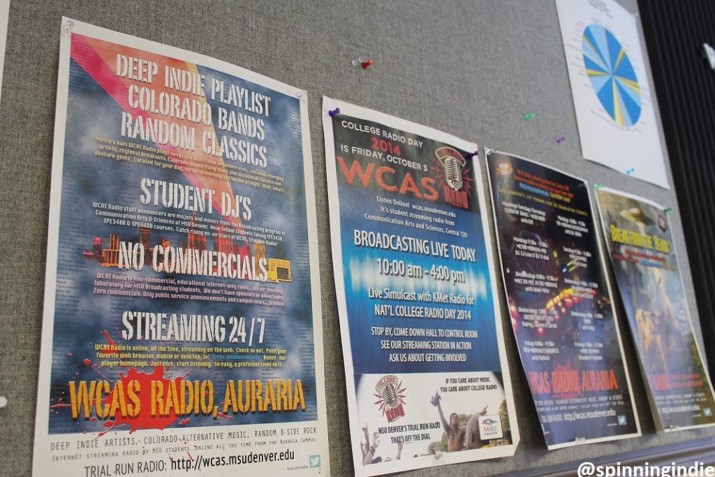 Promotional WCAS posters on the wall of the college radio station's studio. Photo: J. Waits