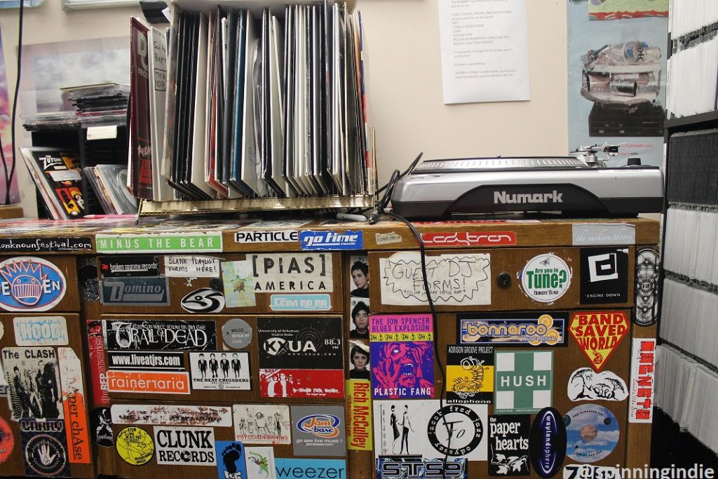 Turntable and vinyl records atop cabinet in KXUA on-air studio. Photo: J. Waits