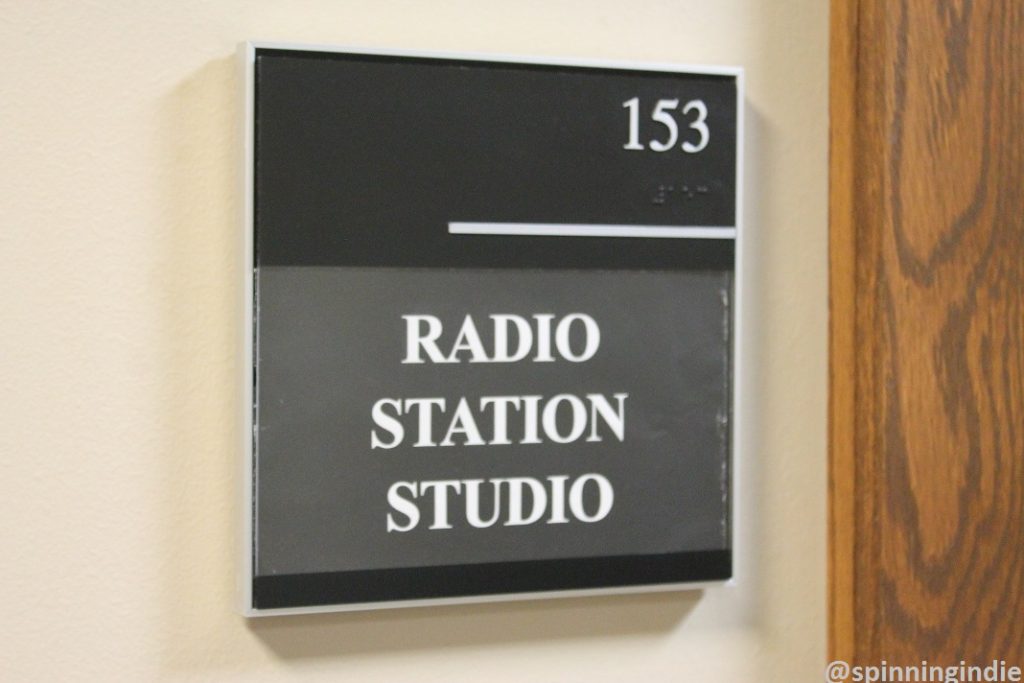 Radio station studio sign outside college radio station KUOZ-LP. Photo: J. Waits