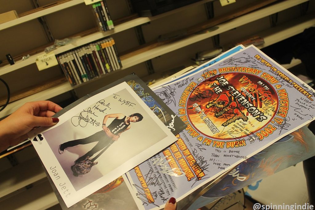 Signed promotional items, including Joan Jett photo, at WYBF. Photo: J. Waits