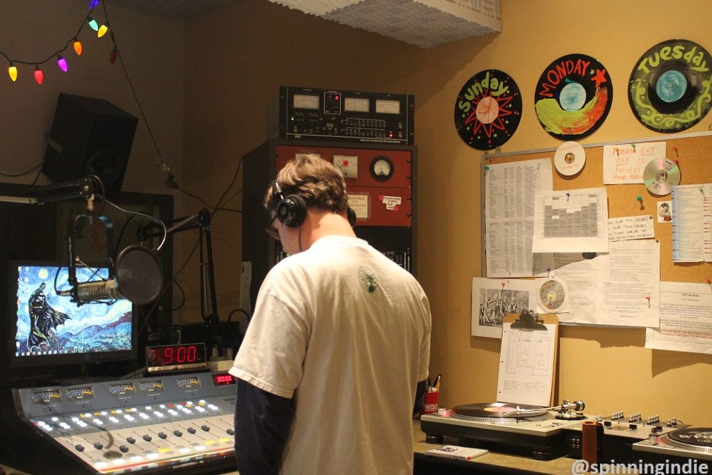 Todd Ranson doing his show at college radio station WDCE. Photo: J. Waits