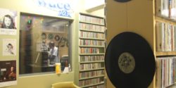 View of college radio station WDCE's on-air studio from the college radio station's CD library. Photo: J. Waits