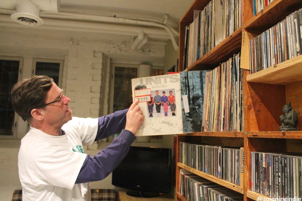 WDCE DJ Todd Ranson peruses the college radio station's library of vinyl LPs. Photo: J. Waits