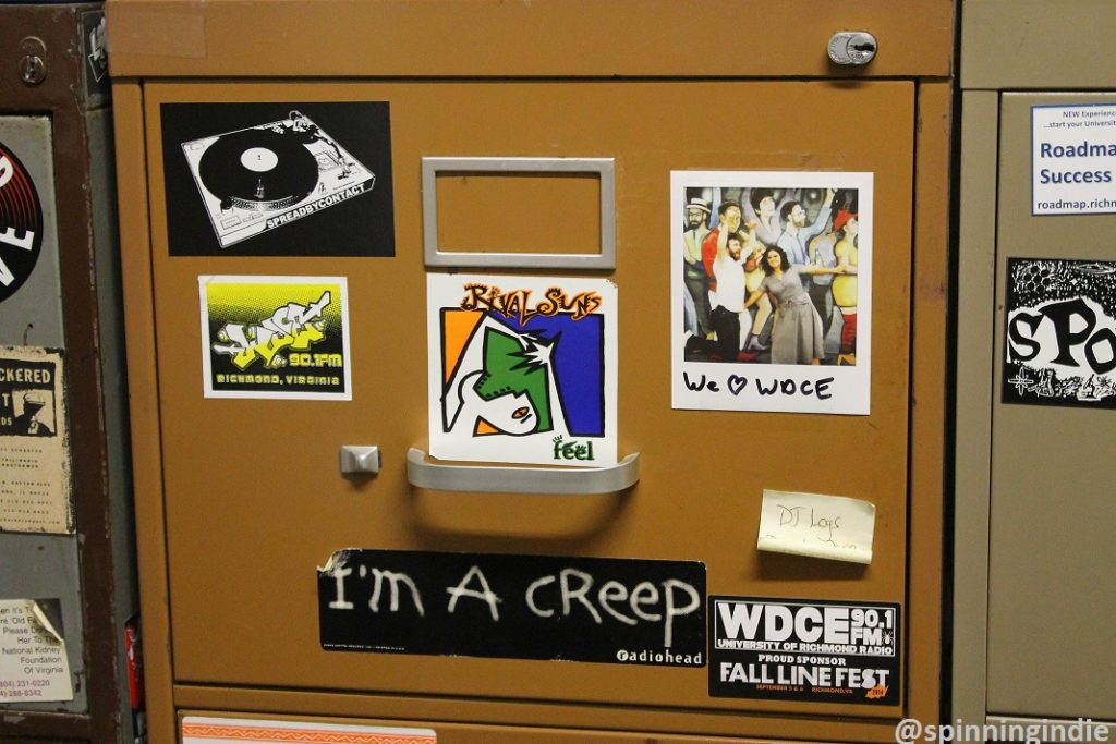 Sticker-covered file cabinet at WDCE. Photo: J. Waits