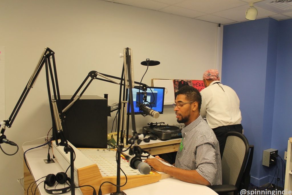 Derwood Selby (front) and DJ Affirmation (on turntables) in the WPPM-LP studio. Photo: J. Waits