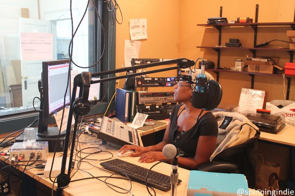 Baby Talk host Mamma J. (Jaynene Johnson) in KLLG-LP studio. Photo: J. Waits/Radio Survivor