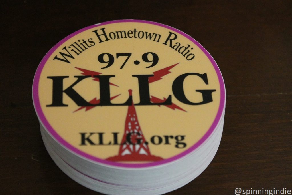 KLLG-LP stickers at the LPFM community radio station. Photo: J. Waits/Radio Survivor