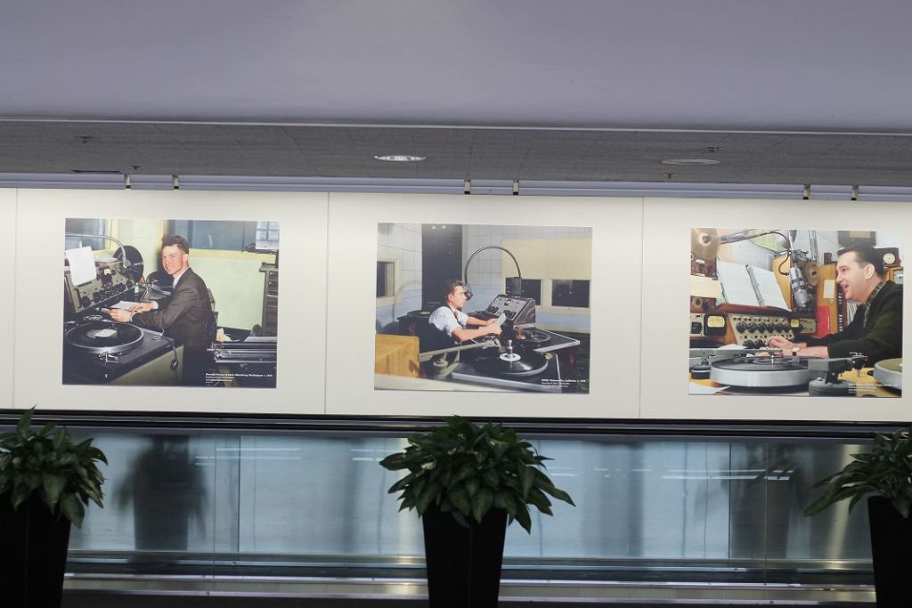 Photos in the "On the Radio" exhibit alongside the "people mover" at SFO. Photo: J. Waits