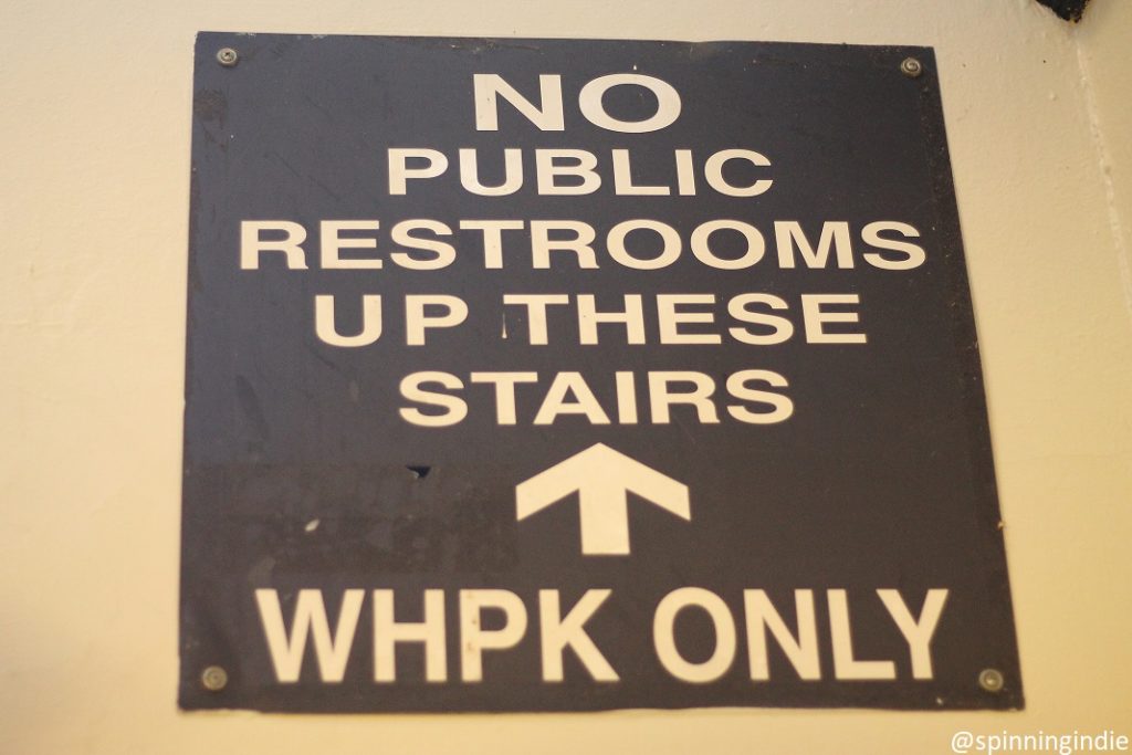 "No public restrooms up these stairs. WHPK only" sign at WHPK. Photo: J. Waits