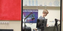 Student in studio of high school radio station VCS Radio. Photo: J. Waits