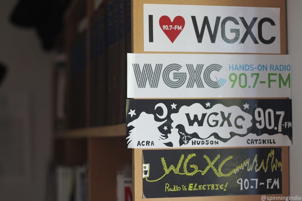 WGXC stickers on shelf at Wave Farm's Study Center. Photo: J. Waits