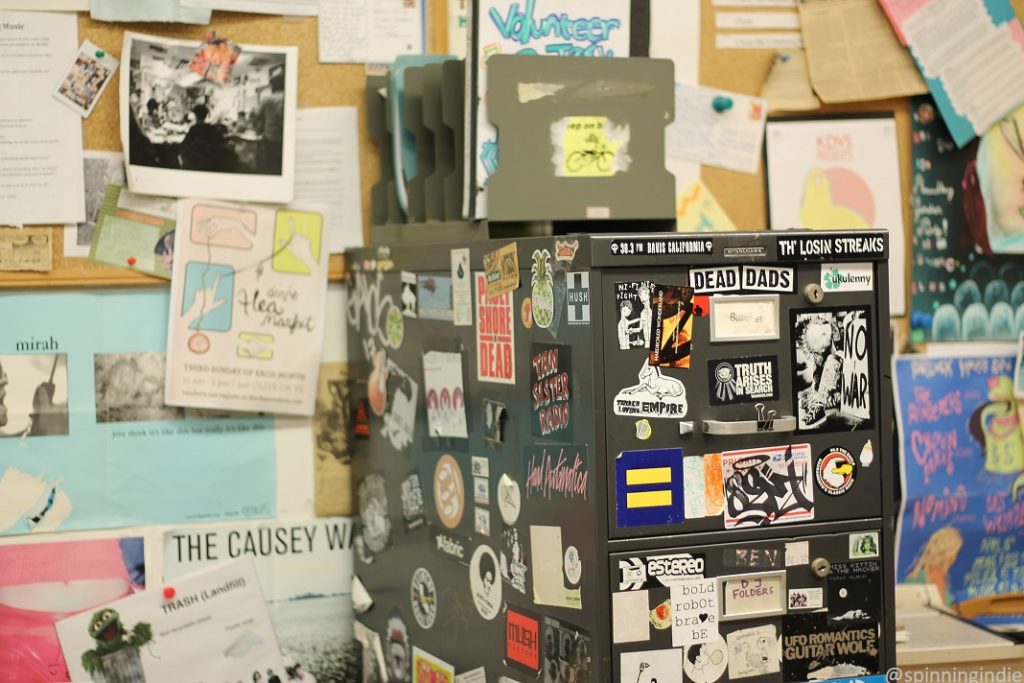 Sticker-covered cabinet at KDVS. Photo: J. Waits