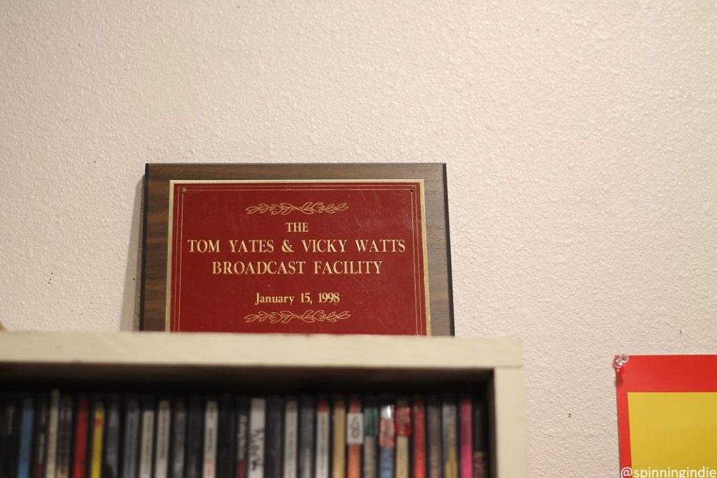 1998 Tom Yates and Vicky Watts Broadcast Facility plaque in studio of KAKX. Photo: J. Waits