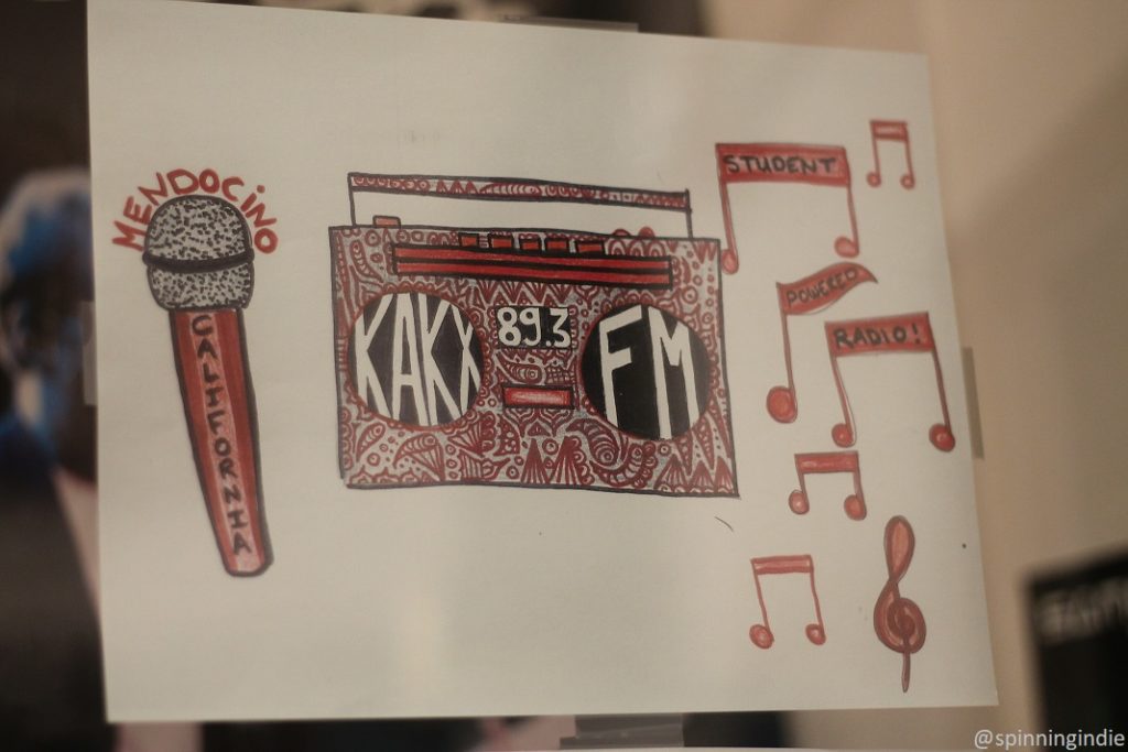 KAKX flyer in the high school radio station's studio. Photo: J. Waits