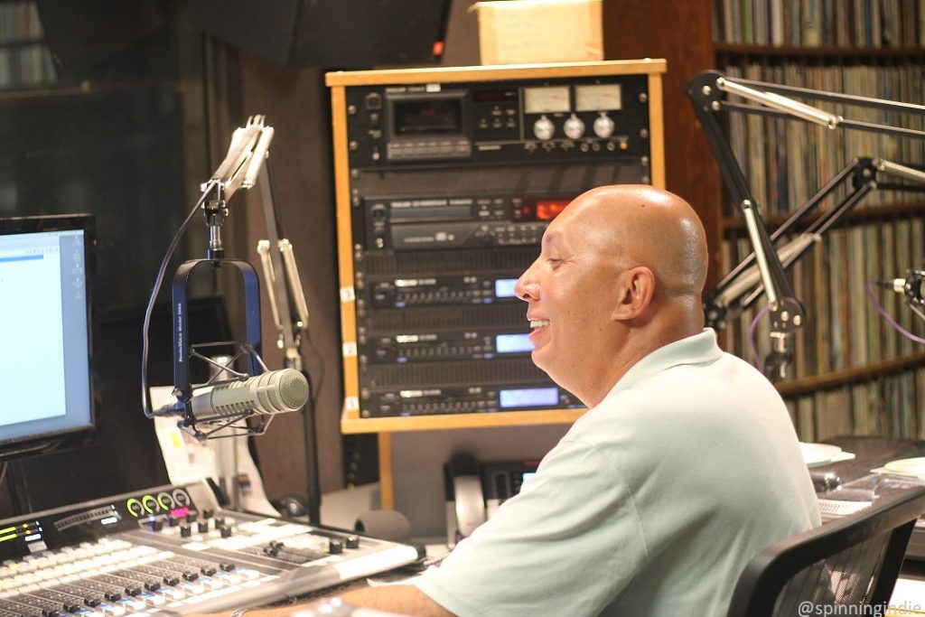 WVKR show host in studio. Photo: J. Waits