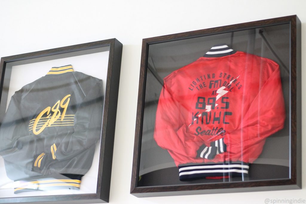 Vintage C89.5 jackets on the wall of the high school radio station. Photo: J. Waits