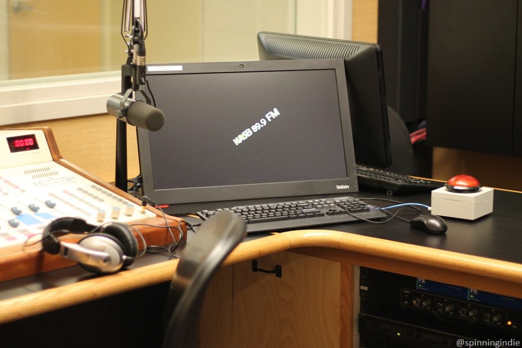 Computer in KASB on-air studio with KASB 89.9 FM screen saver. Photo: J. Waits/Radio Survivor