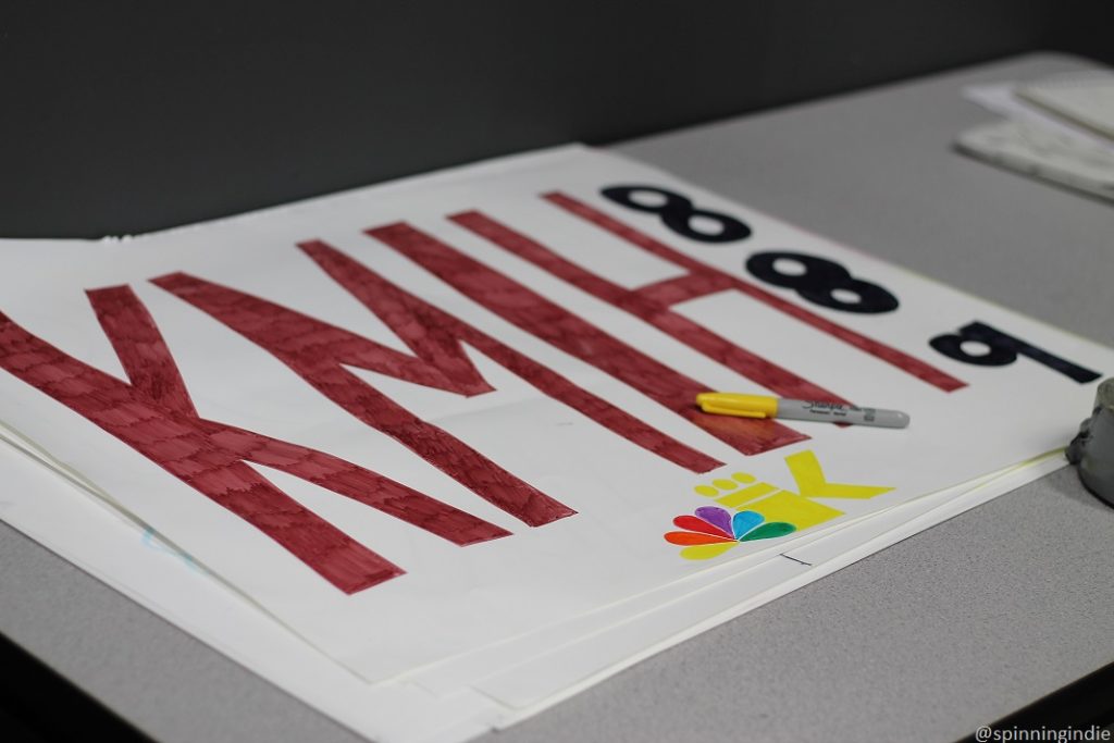 Hand-made poster: "KMIH 88.9" with yellow sharpie atop the sign. Photo: J. Waits/Radio Survivor