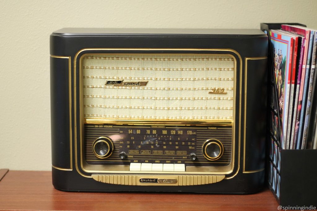 Antique radio and magazines in KBCS lobby. Photo: J. Waits/Radio Survivor