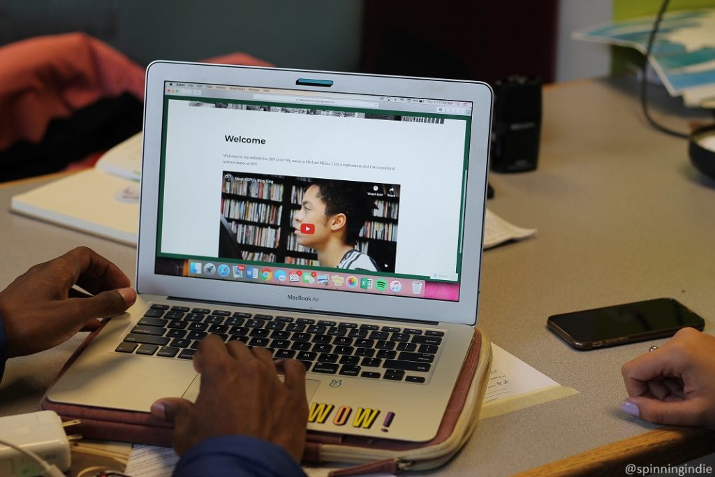 Michael Miller shows a video interview on his laptop that was part of a class project that he did about college radio station KSPU. Photo: J. Waits/Radio Survivor