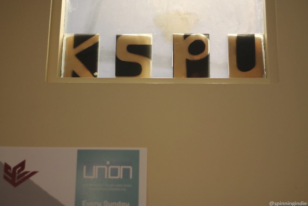 KSPU window, with letters K-S-P-U on display, as seen from within Weter Memorial Hall. Photo: J. Waits/Radio Survivor