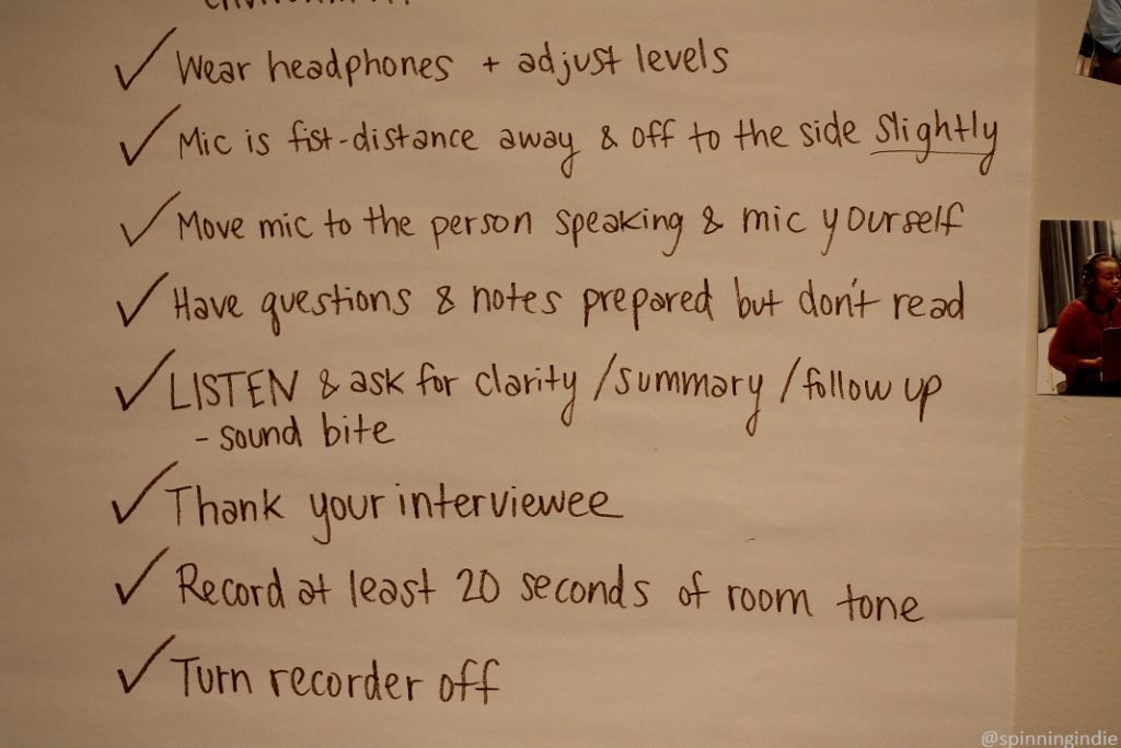 "Recording an effective interview" tips posted on wall at KMGP-LP, including "wear headphones + adjust levels," "mic is fist-distance away..." and more. Photo: J. Waits/Radio Survivor