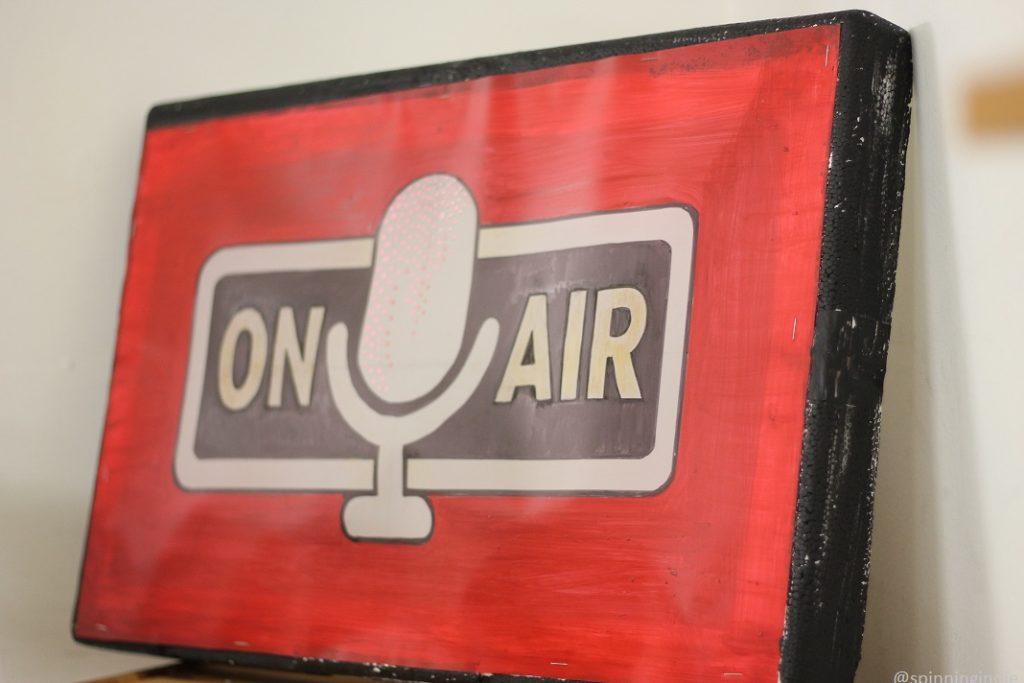Painting of "on air" sign with microphone at Space 101.1 FM. Photo: J. Waits/Radio Survivor