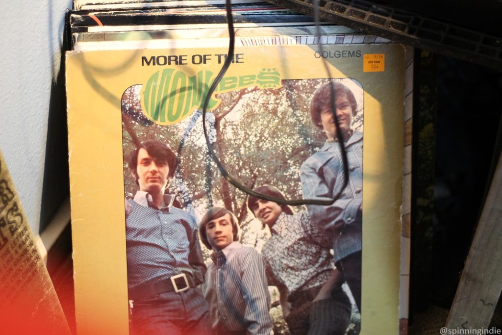 Collection of vinyl LPs, including "More of the Monkees" on the floor of community radio station KBFG-LP's Shack. Photo: J. Waits/Radio Survivor