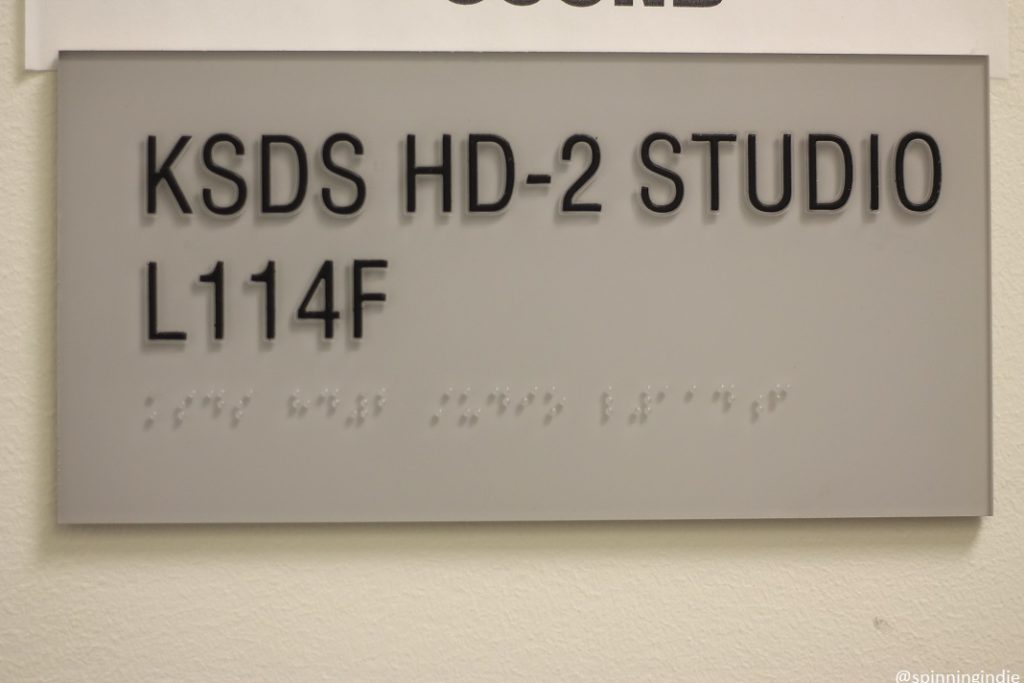 SDS studio sign reads "KSDS HD-2 STUDIO L114F" and has braille beneath the letters. Photo: J. Waits/Radio Survivor