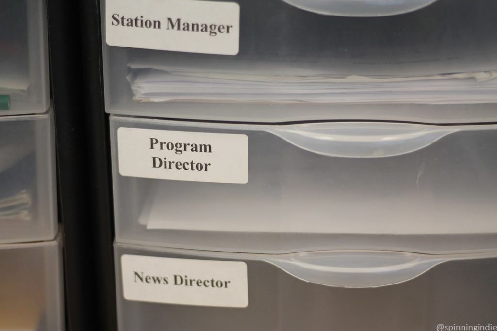 Bins labeled "Station Manager," "Program Director" and "News Director" at Griffin Radio. Photo: J. Waits/Radio Survivor