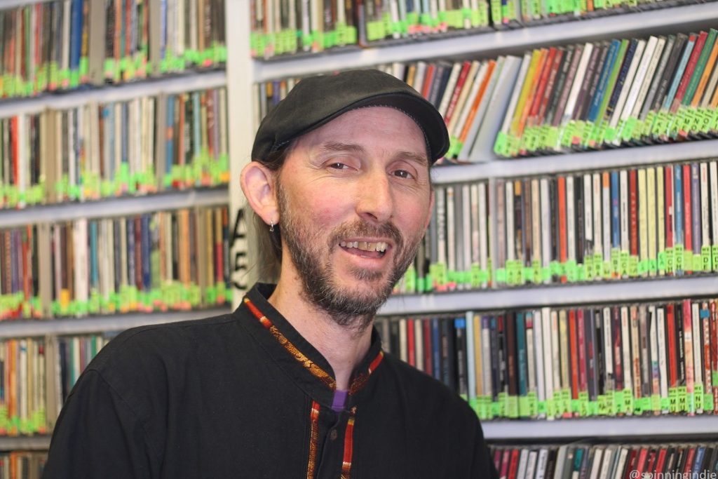 KGNU station manager Tim Russo in the community radio station's CD library. Photo: J. Waits