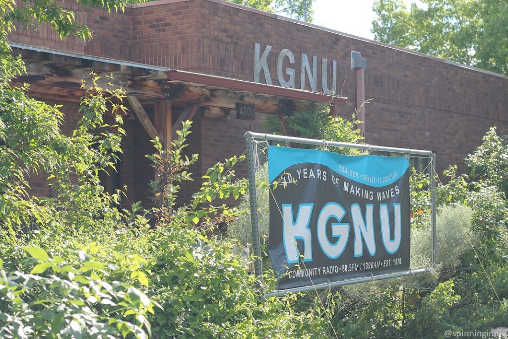 Entrance to community radio station KGNU. Banner in front reads: "40 years of making waves. KGNU community radio ..." Photo: J. Waits/Radio Survivor