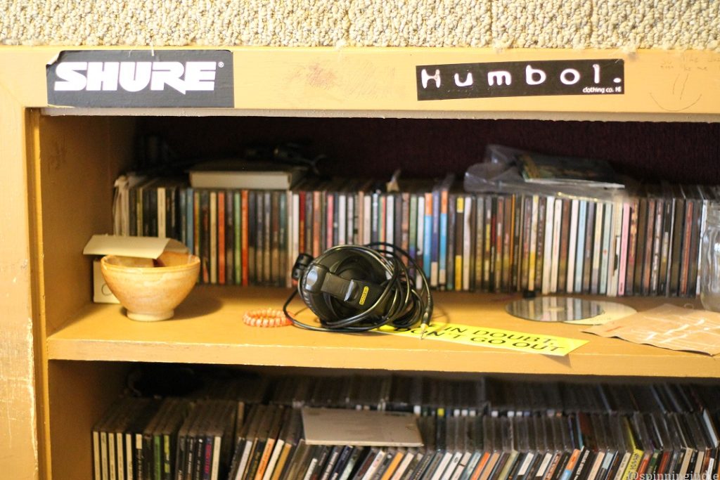 Shelf of CDs in KOPO-LP studio. Photo: J. Waits/Radio Survivor