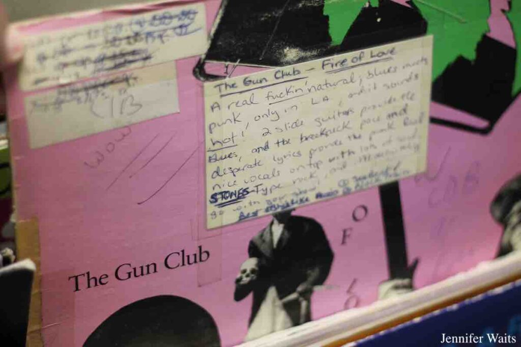 Vinyl record from The Gun Club at college radio station WCDB includes hand written review of the release. Photo: J. Waits